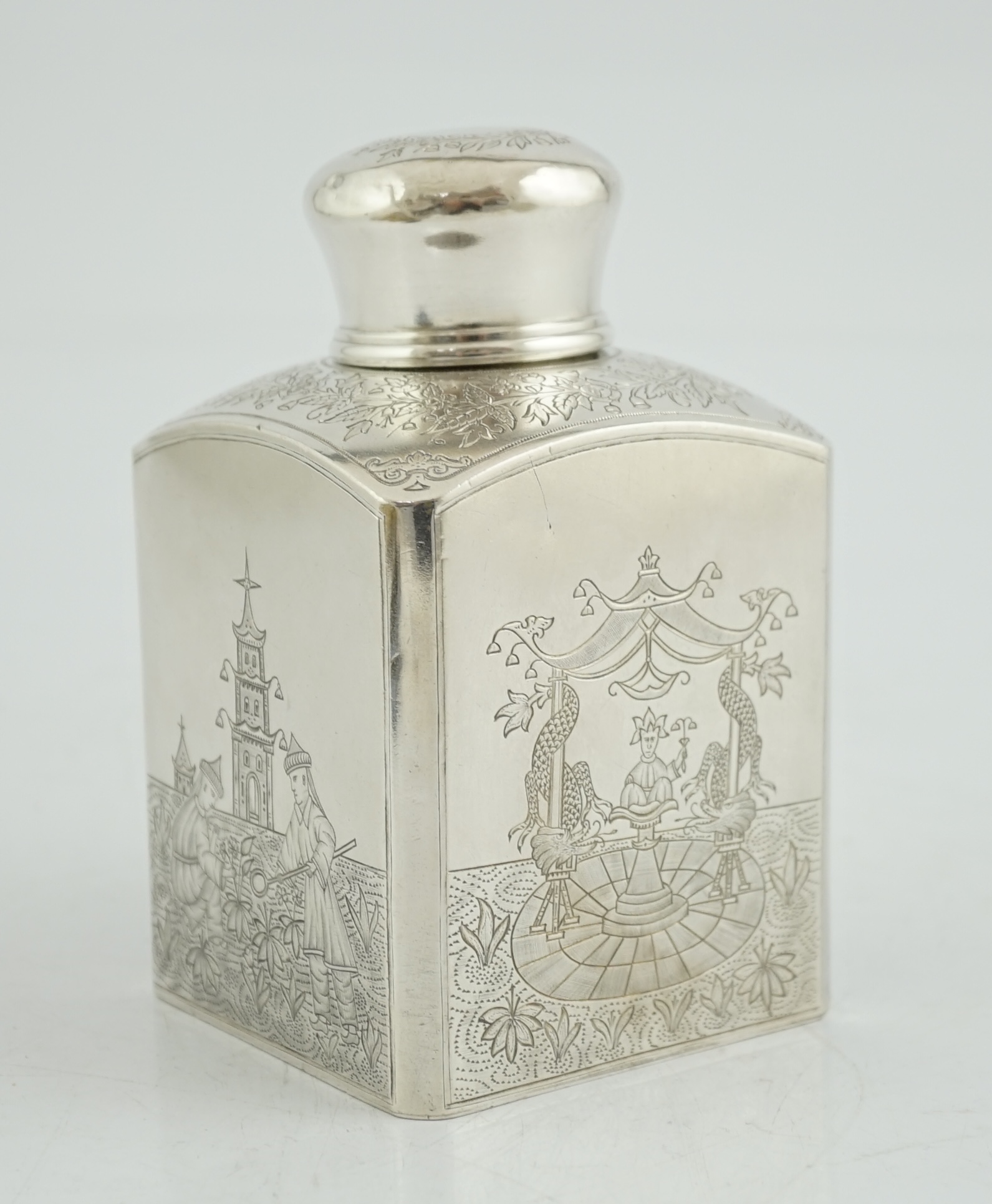 A late 19th century Russian 84 zolotnik silver rectangular tea caddy and cover, with engraved Chinoiserie decoration